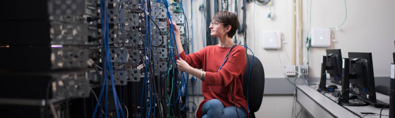 GVSU Information Technology student in an information systems lab.